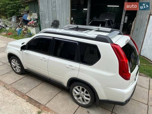 Білий Ніссан ІксТрейл, об'ємом двигуна 2 л та пробігом 179 тис. км за 13300 $, фото 11 на Automoto.ua