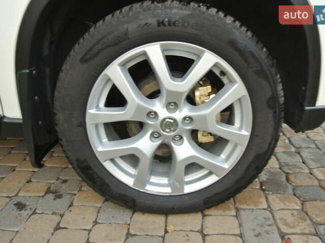 Білий Ніссан ІксТрейл, об'ємом двигуна 2 л та пробігом 230 тис. км за 13999 $, фото 63 на Automoto.ua