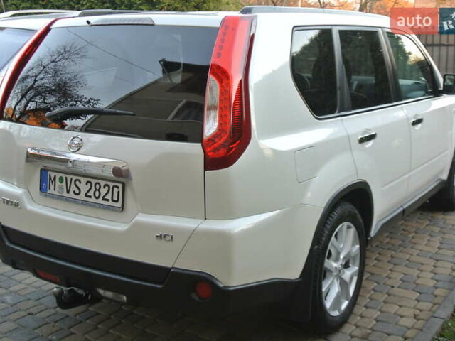 Білий Ніссан ІксТрейл, об'ємом двигуна 2 л та пробігом 230 тис. км за 13999 $, фото 4 на Automoto.ua