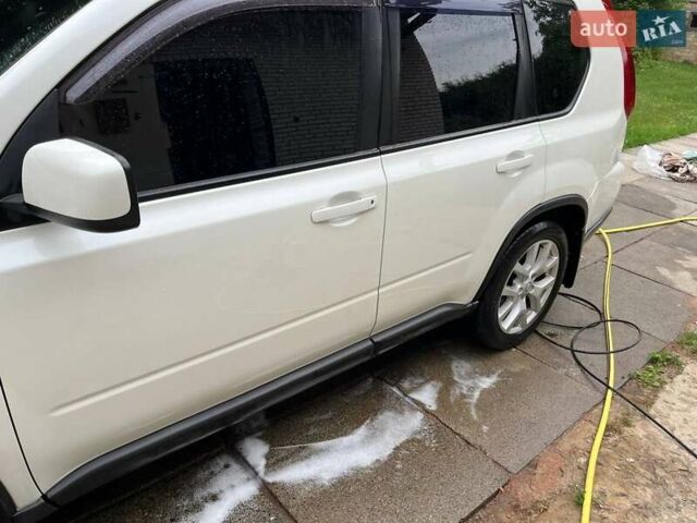 Білий Ніссан ІксТрейл, об'ємом двигуна 2 л та пробігом 179 тис. км за 13300 $, фото 18 на Automoto.ua