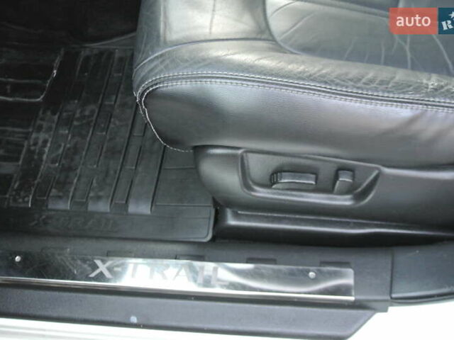 Білий Ніссан ІксТрейл, об'ємом двигуна 2 л та пробігом 230 тис. км за 13999 $, фото 11 на Automoto.ua