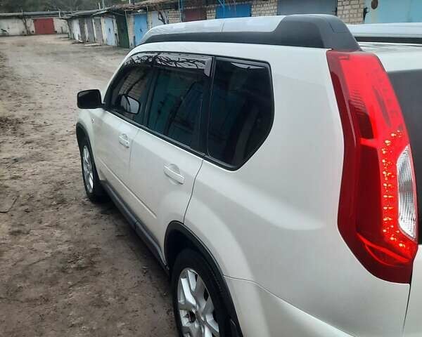Белый Ниссан ИксТрейл, объемом двигателя 2 л и пробегом 194 тыс. км за 11000 $, фото 7 на Automoto.ua