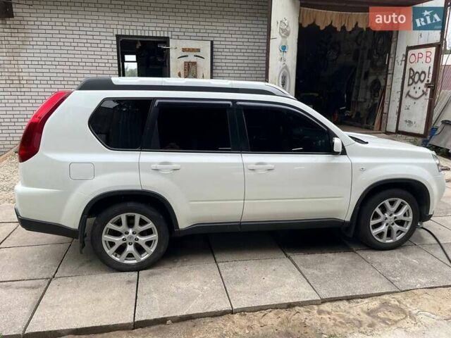 Білий Ніссан ІксТрейл, об'ємом двигуна 2 л та пробігом 179 тис. км за 13300 $, фото 9 на Automoto.ua