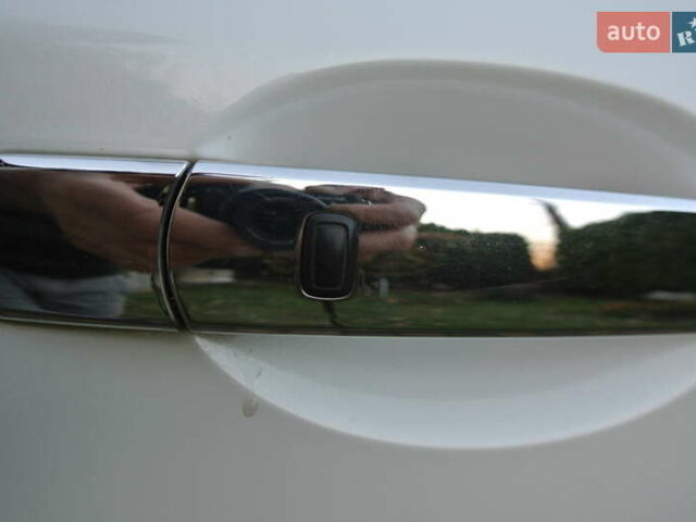 Білий Ніссан ІксТрейл, об'ємом двигуна 2 л та пробігом 230 тис. км за 13999 $, фото 23 на Automoto.ua