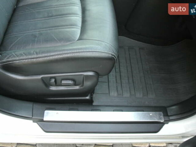 Білий Ніссан ІксТрейл, об'ємом двигуна 2 л та пробігом 230 тис. км за 13999 $, фото 18 на Automoto.ua