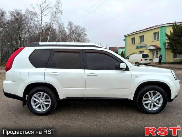 Белый Ниссан ИксТрейл, объемом двигателя 2 л и пробегом 170 тыс. км за 10450 $, фото 1 на Automoto.ua