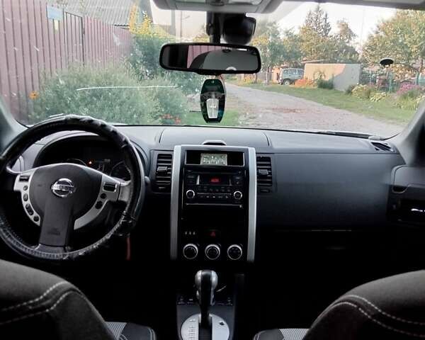 Белый Ниссан ИксТрейл, объемом двигателя 2 л и пробегом 145 тыс. км за 14000 $, фото 3 на Automoto.ua