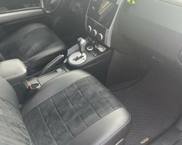 Білий Ніссан ІксТрейл, об'ємом двигуна 2 л та пробігом 259 тис. км за 12800 $, фото 14 на Automoto.ua