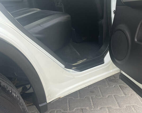 Білий Ніссан ІксТрейл, об'ємом двигуна 2 л та пробігом 259 тис. км за 12800 $, фото 10 на Automoto.ua