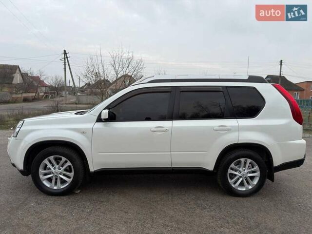 Белый Ниссан ИксТрейл, объемом двигателя 2 л и пробегом 170 тыс. км за 10450 $, фото 9 на Automoto.ua