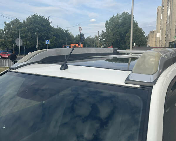 Білий Ніссан ІксТрейл, об'ємом двигуна 2 л та пробігом 259 тис. км за 12800 $, фото 19 на Automoto.ua