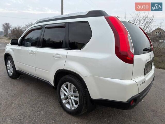 Белый Ниссан ИксТрейл, объемом двигателя 2 л и пробегом 170 тыс. км за 10450 $, фото 16 на Automoto.ua
