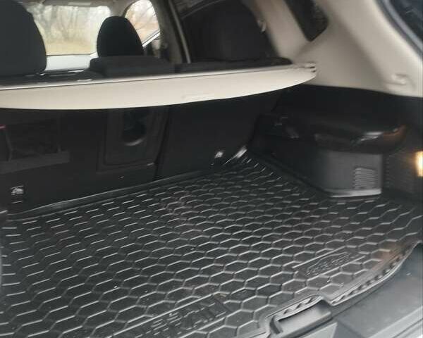 Белый Ниссан ИксТрейл, объемом двигателя 1.6 л и пробегом 81 тыс. км за 19000 $, фото 12 на Automoto.ua