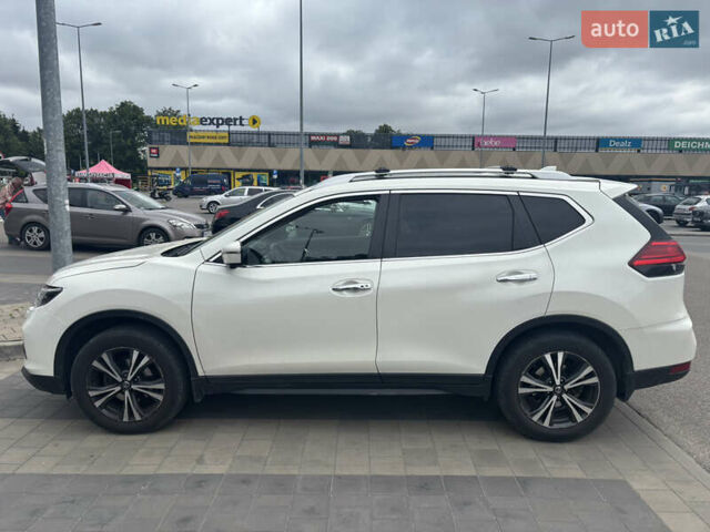 Белый Ниссан ИксТрейл, объемом двигателя 1.6 л и пробегом 107 тыс. км за 23000 $, фото 2 на Automoto.ua