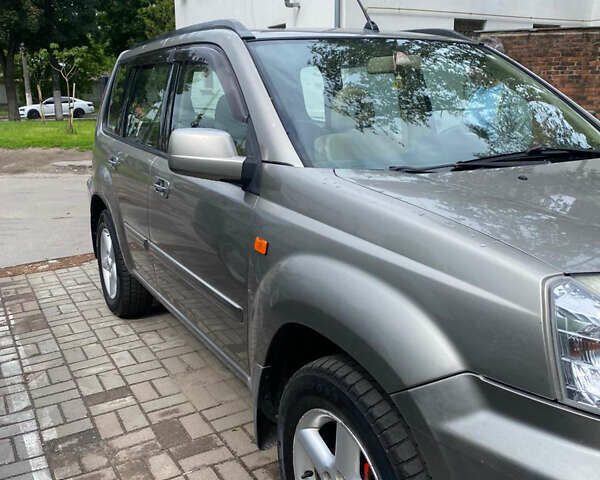 Бежевый Ниссан ИксТрейл, объемом двигателя 2 л и пробегом 305 тыс. км за 4700 $, фото 3 на Automoto.ua