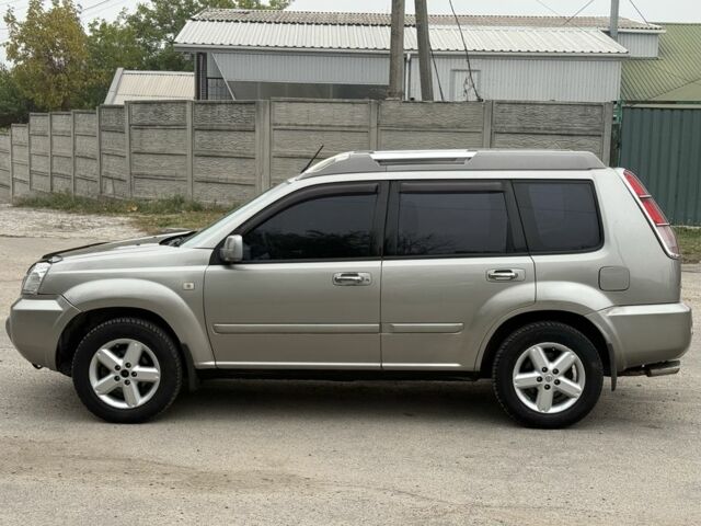 Бежевый Ниссан ИксТрейл, объемом двигателя 2.5 л и пробегом 265 тыс. км за 6000 $, фото 5 на Automoto.ua