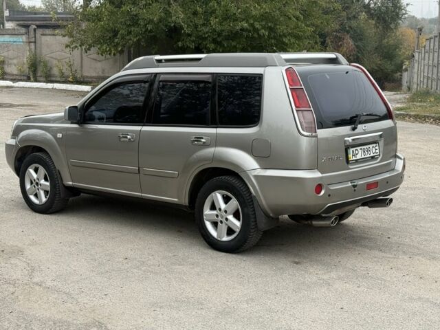 Бежевый Ниссан ИксТрейл, объемом двигателя 2.5 л и пробегом 265 тыс. км за 6000 $, фото 3 на Automoto.ua