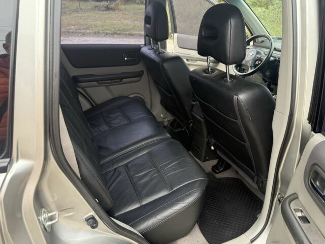 Бежевый Ниссан ИксТрейл, объемом двигателя 2.5 л и пробегом 265 тыс. км за 6000 $, фото 15 на Automoto.ua