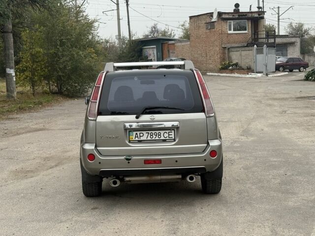 Бежевый Ниссан ИксТрейл, объемом двигателя 2.5 л и пробегом 265 тыс. км за 6000 $, фото 2 на Automoto.ua