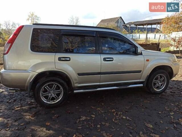 Бежевый Ниссан ИксТрейл, объемом двигателя 2.49 л и пробегом 283 тыс. км за 6000 $, фото 4 на Automoto.ua