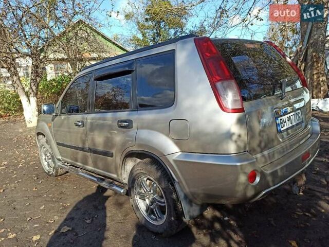 Бежевый Ниссан ИксТрейл, объемом двигателя 2.49 л и пробегом 283 тыс. км за 6000 $, фото 2 на Automoto.ua