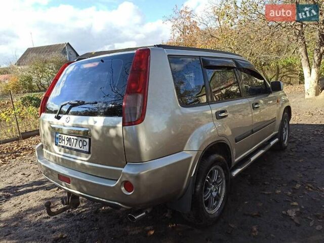 Бежевый Ниссан ИксТрейл, объемом двигателя 2.49 л и пробегом 283 тыс. км за 6000 $, фото 3 на Automoto.ua