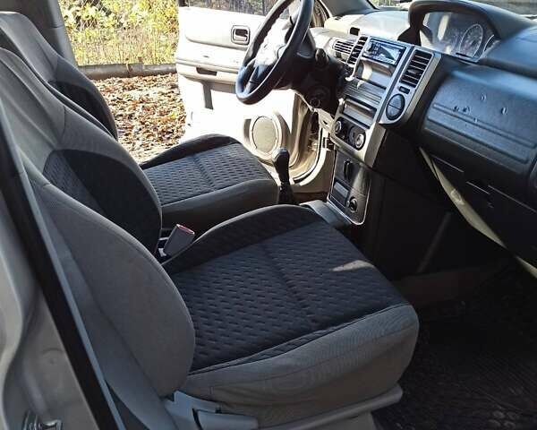 Бежевый Ниссан ИксТрейл, объемом двигателя 2.49 л и пробегом 283 тыс. км за 6000 $, фото 6 на Automoto.ua