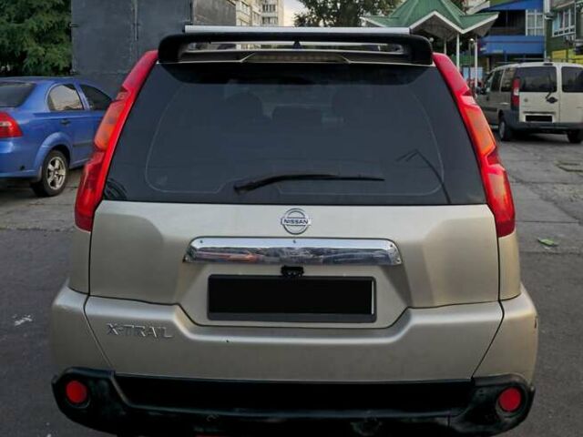 Бежевий Ніссан ІксТрейл, об'ємом двигуна 2 л та пробігом 285 тис. км за 7500 $, фото 5 на Automoto.ua