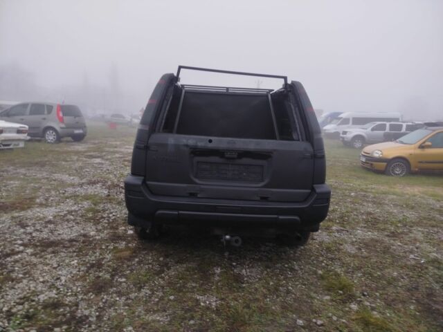 Черный Ниссан ИксТрейл, объемом двигателя 2.2 л и пробегом 300 тыс. км за 3000 $, фото 3 на Automoto.ua