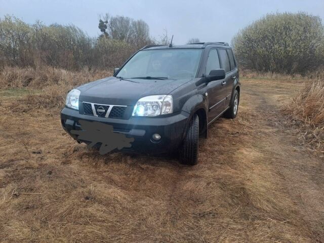 Черный Ниссан ИксТрейл, объемом двигателя 2.2 л и пробегом 290 тыс. км за 4500 $, фото 4 на Automoto.ua