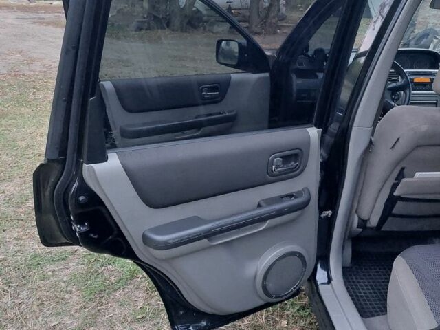 Черный Ниссан ИксТрейл, объемом двигателя 2.2 л и пробегом 260 тыс. км за 3000 $, фото 10 на Automoto.ua