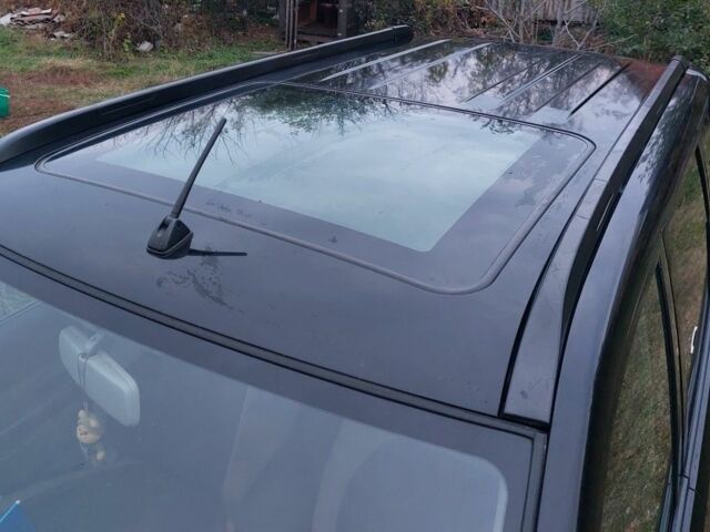 Черный Ниссан ИксТрейл, объемом двигателя 2.2 л и пробегом 260 тыс. км за 3000 $, фото 7 на Automoto.ua