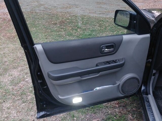 Черный Ниссан ИксТрейл, объемом двигателя 2.2 л и пробегом 260 тыс. км за 3000 $, фото 8 на Automoto.ua