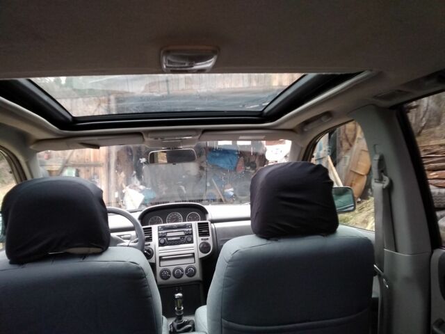 Чорний Ніссан ІксТрейл, об'ємом двигуна 2.2 л та пробігом 300 тис. км за 8281 $, фото 2 на Automoto.ua