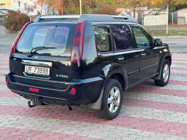 Черный Ниссан ИксТрейл, объемом двигателя 2.2 л и пробегом 250 тыс. км за 2500 $, фото 5 на Automoto.ua