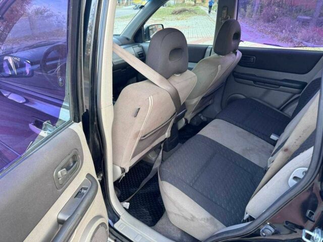 Черный Ниссан ИксТрейл, объемом двигателя 2.2 л и пробегом 250 тыс. км за 2500 $, фото 9 на Automoto.ua