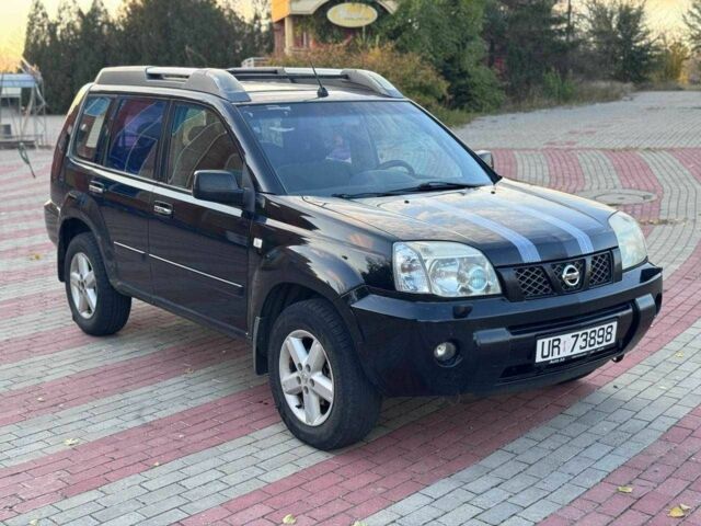Черный Ниссан ИксТрейл, объемом двигателя 2.2 л и пробегом 250 тыс. км за 2500 $, фото 2 на Automoto.ua