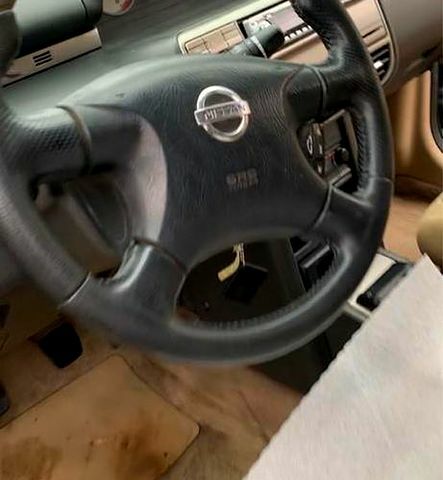 Черный Ниссан ИксТрейл, объемом двигателя 2.2 л и пробегом 372 тыс. км за 3500 $, фото 4 на Automoto.ua