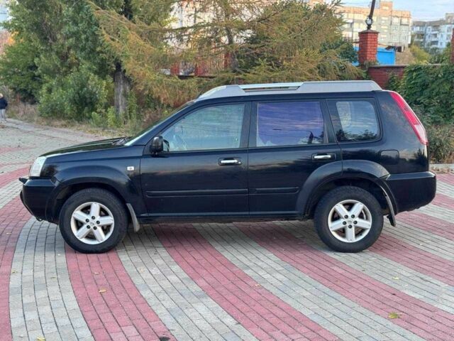 Черный Ниссан ИксТрейл, объемом двигателя 2.2 л и пробегом 250 тыс. км за 2500 $, фото 4 на Automoto.ua