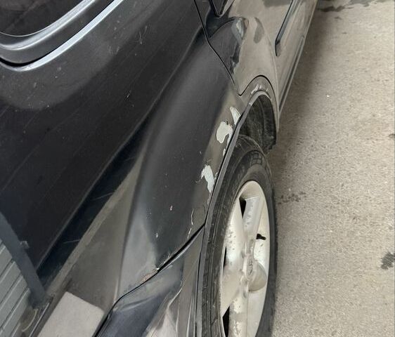 Черный Ниссан ИксТрейл, объемом двигателя 2.2 л и пробегом 385 тыс. км за 2800 $, фото 6 на Automoto.ua