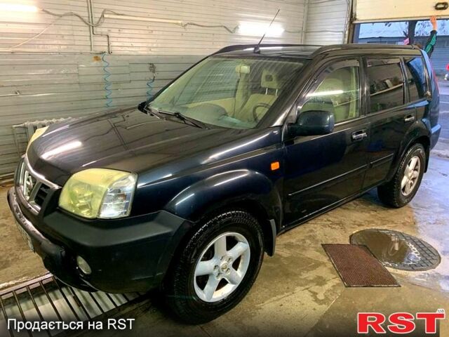 Черный Ниссан ИксТрейл, объемом двигателя 2.2 л и пробегом 372 тыс. км за 3500 $, фото 7 на Automoto.ua