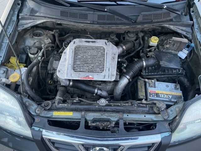 Черный Ниссан ИксТрейл, объемом двигателя 2.2 л и пробегом 412 тыс. км за 2900 $, фото 7 на Automoto.ua