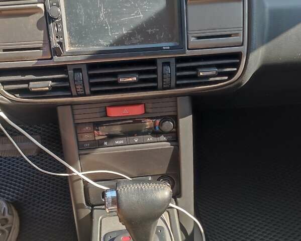 Черный Ниссан ИксТрейл, объемом двигателя 2 л и пробегом 227 тыс. км за 5200 $, фото 5 на Automoto.ua