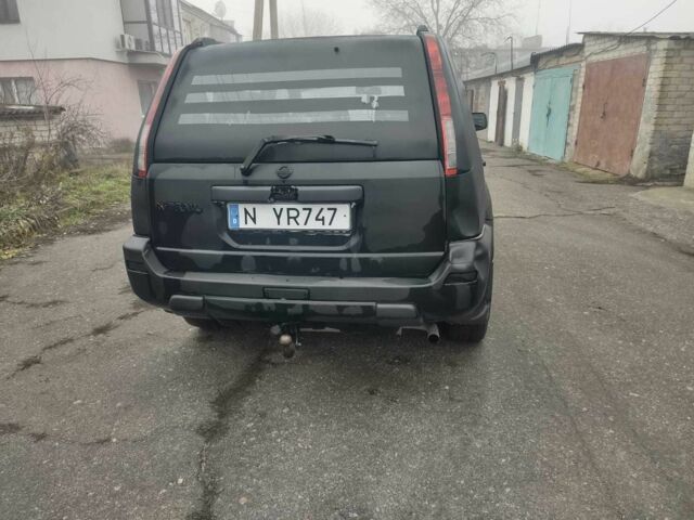 Черный Ниссан ИксТрейл, объемом двигателя 2.2 л и пробегом 220 тыс. км за 3350 $, фото 8 на Automoto.ua