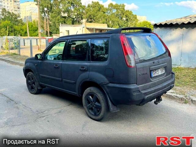 Черный Ниссан ИксТрейл, объемом двигателя 2 л и пробегом 300 тыс. км за 2550 $, фото 1 на Automoto.ua