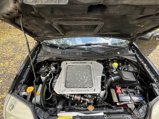 Черный Ниссан ИксТрейл, объемом двигателя 2.2 л и пробегом 275 тыс. км за 3000 $, фото 11 на Automoto.ua