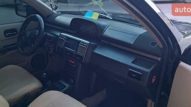 Черный Ниссан ИксТрейл, объемом двигателя 2 л и пробегом 300 тыс. км за 6300 $, фото 14 на Automoto.ua