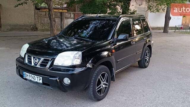 Черный Ниссан ИксТрейл, объемом двигателя 2 л и пробегом 300 тыс. км за 6300 $, фото 9 на Automoto.ua