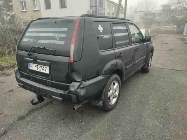 Черный Ниссан ИксТрейл, объемом двигателя 2.2 л и пробегом 220 тыс. км за 3350 $, фото 7 на Automoto.ua