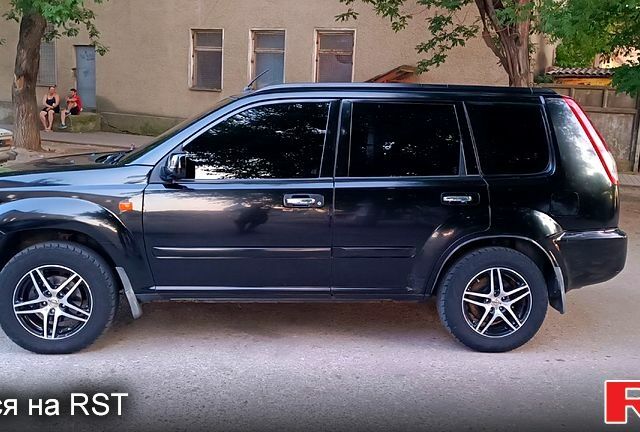 Черный Ниссан ИксТрейл, объемом двигателя 2 л и пробегом 257 тыс. км за 5800 $, фото 2 на Automoto.ua